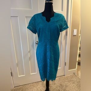 Green lace sheath dress